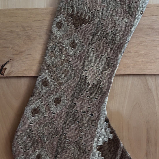 Beige and cream handmade Turkish Christmas stocking featuring geometric designs throughout