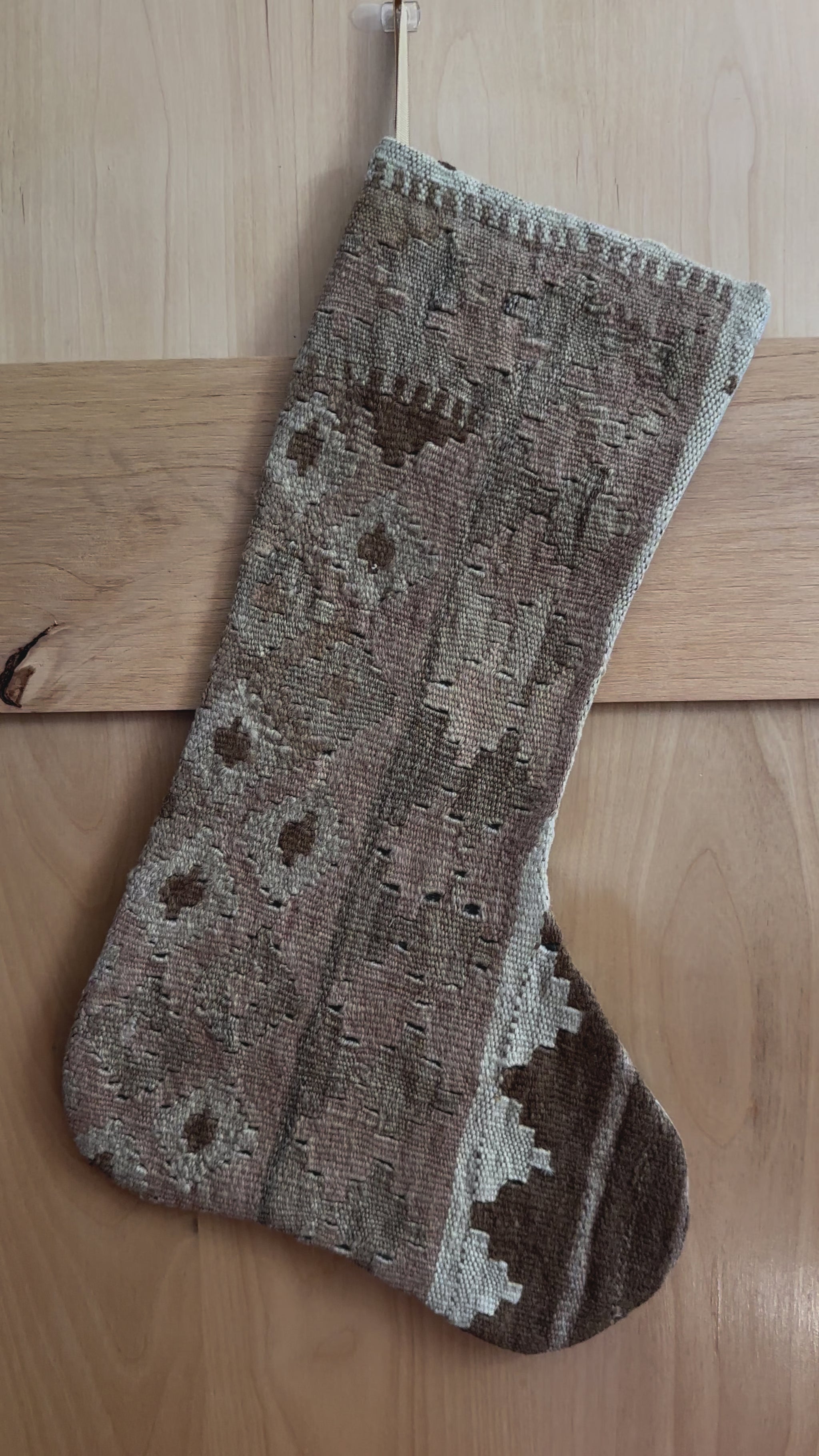 Beige and cream handmade Turkish Christmas stocking featuring geometric designs throughout