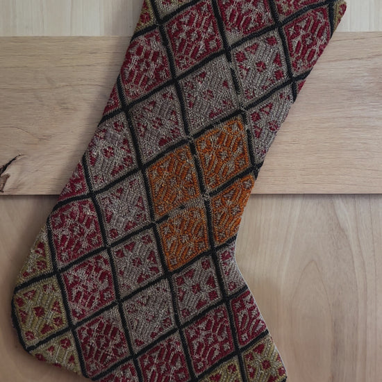 colorful handmade Turkish Christmas stocking featuring a checkered quilted pattern