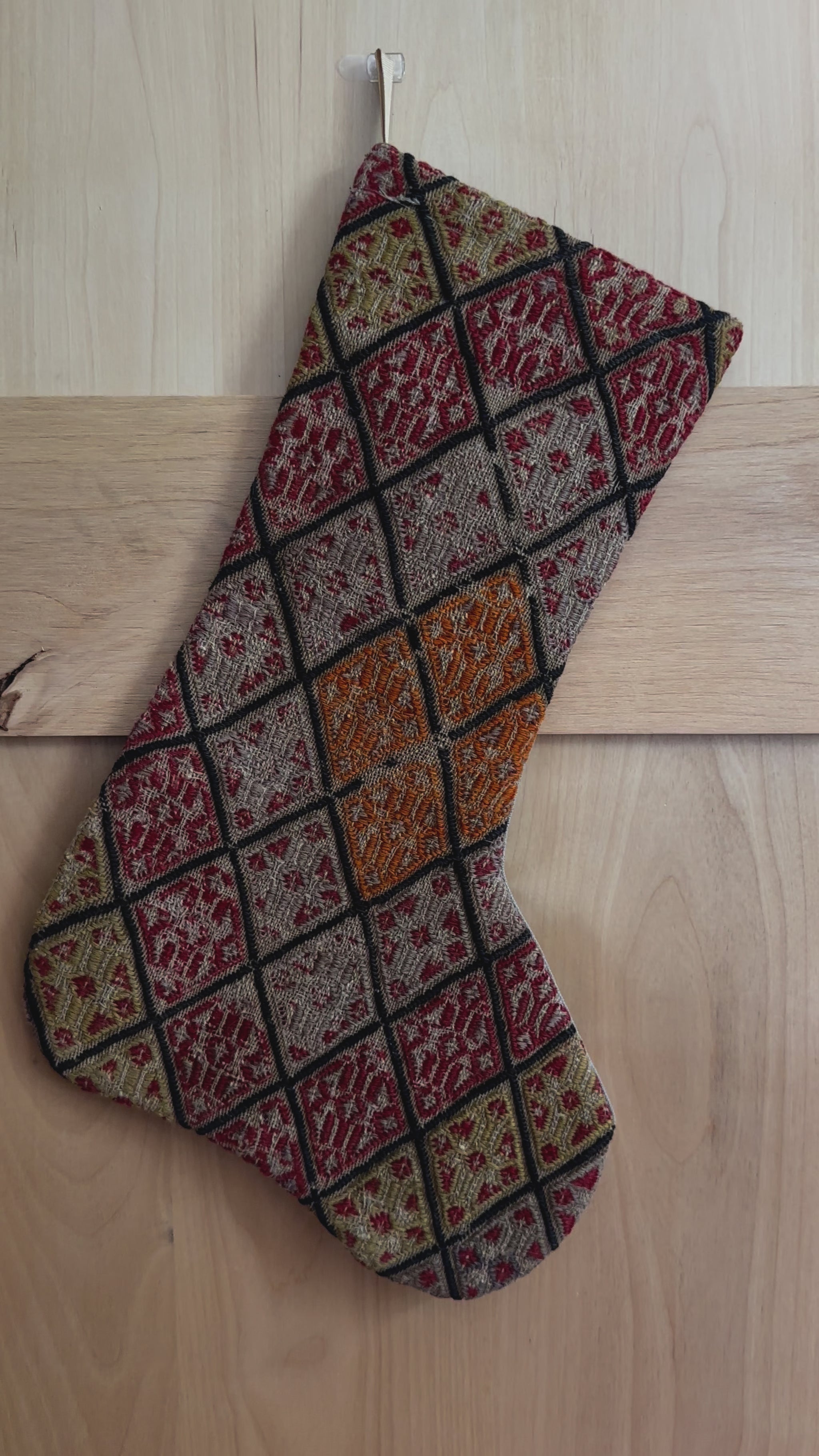 colorful handmade Turkish Christmas stocking featuring a checkered quilted pattern