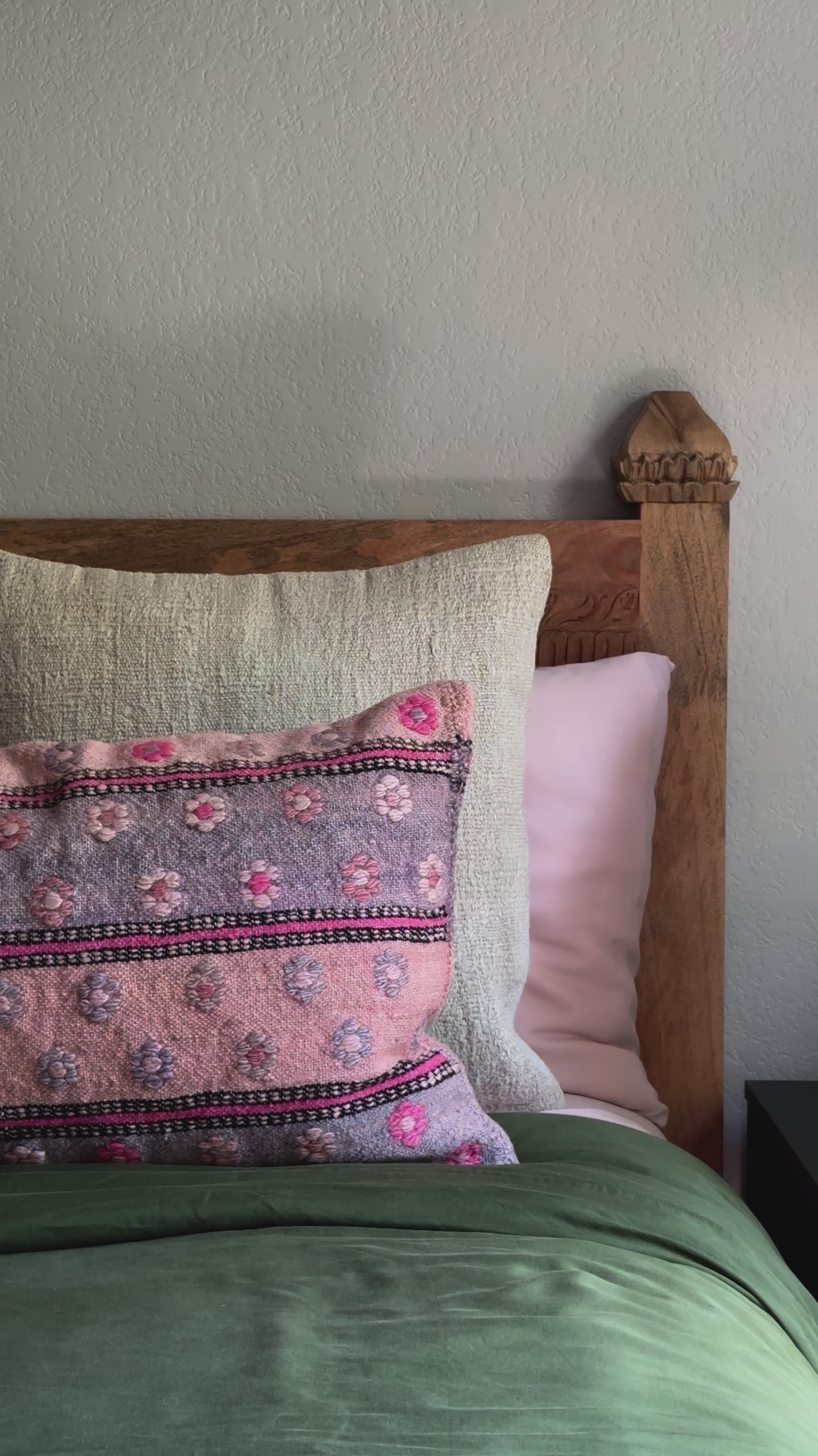 16 by 24 inch handmade Turkish lumbar pillow featuring a pink and purple striped design and embroidered pink flowers throughout