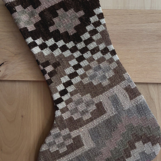 brown and cream handmade Turkish Christmas stocking featuring checkered lines and other geometric shapes